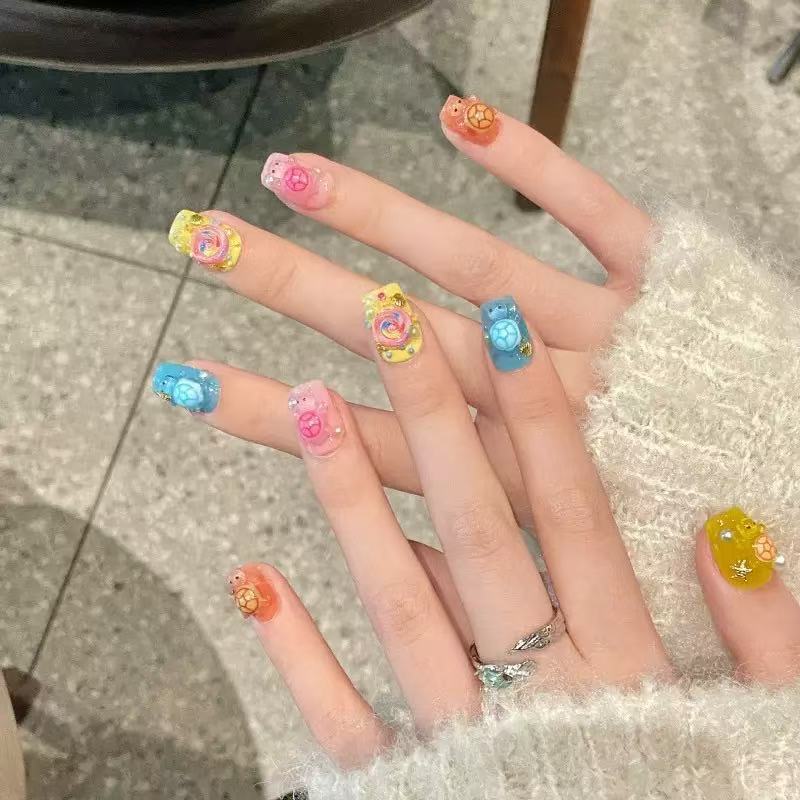 100 قطعة من الزخارف الراتنجية  - مراجعة Nail Art Fake وسعره